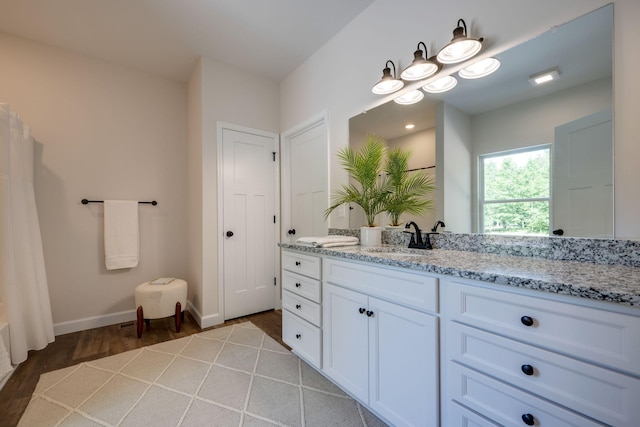 766 Billy Wynn Rd, Dickson, TN 37055 - full bath featuring vanity and wood finished floors
