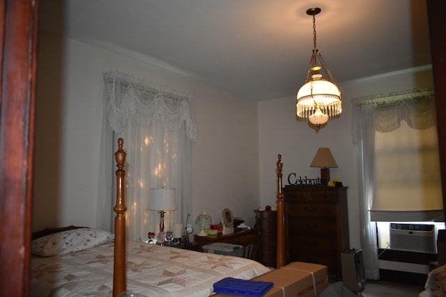 704 Main St N, Carthage, TN 37030 - bedroom with a chandelier, cooling unit, and multiple windows