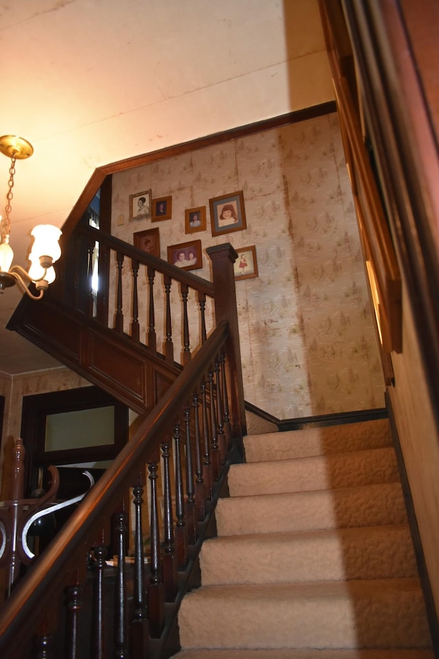 704 Main St N, Carthage, TN 37030 - stairs with a chandelier