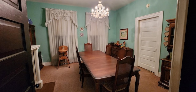 704 Main St N, Carthage, TN 37030 - carpeted dining space featuring a chandelier