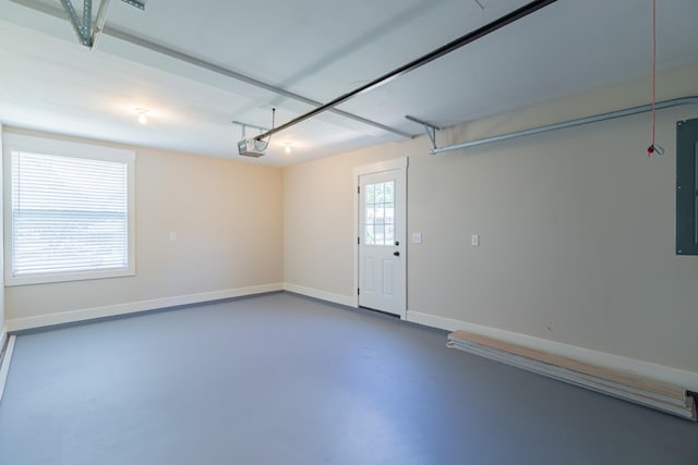 4893 Rainer Dr, Old Hickory, TN 37138 - garage featuring a garage door opener and electric panel