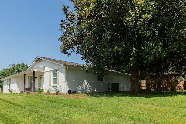 4893 Rainer Dr, Old Hickory, TN 37138 - view of side of home with a central air condition unit and brick siding