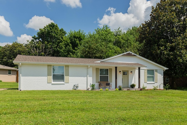 4893 Rainer Dr, Old Hickory, TN 37138 - single story home with brick siding, a front yard, and a porch