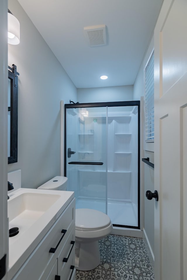 4893 Rainer Dr, Old Hickory, TN 37138 - bathroom featuring vanity, a stall shower, and tile patterned floors