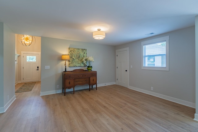 4893 Rainer Dr, Old Hickory, TN 37138 - foyer entrance with plenty of natural light, light wood finished floors, and a chandelier