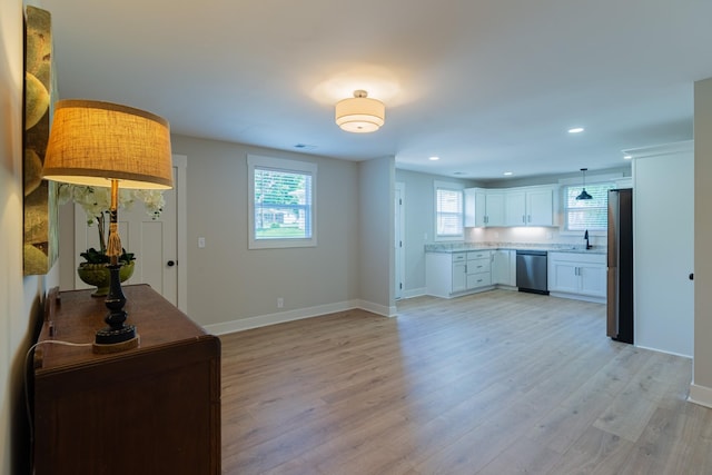 4893 Rainer Dr, Old Hickory, TN 37138 - living room featuring light wood-style floors, healthy amount of natural light, and recessed lighting