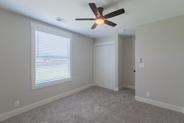 4893 Rainer Dr, Old Hickory, TN 37138 - unfurnished bedroom with carpet flooring, a closet, and a ceiling fan