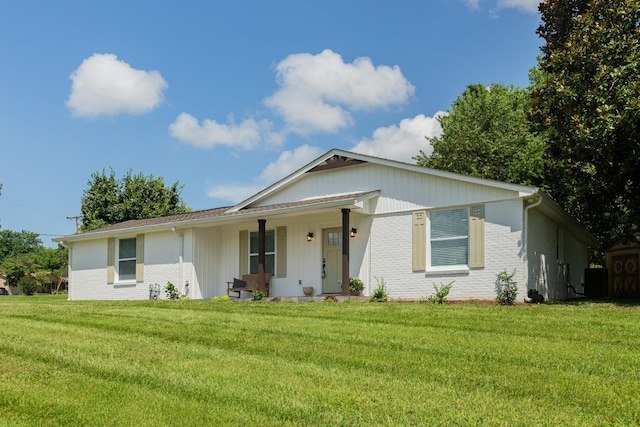 4893 Rainer Dr, Old Hickory, TN 37138 - single story home featuring brick siding, a front yard, and a porch