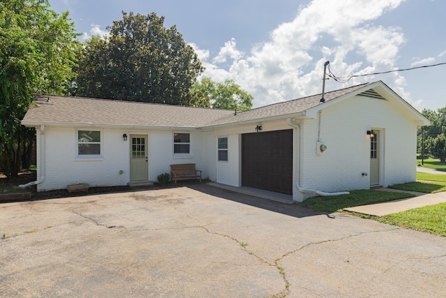 4893 Rainer Dr, Old Hickory, TN 37138 - single story home featuring brick siding, driveway, a garage, and roof with shingles