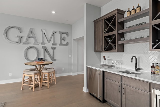 7103A Kyles Creek Dr, Fairview, TN 37062 - kitchen featuring backsplash, open shelves, wood finished floors, light countertops, and recessed lighting