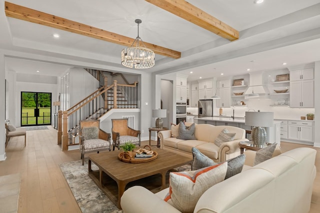 7103A Kyles Creek Dr, Fairview, TN 37062 - living room with stairs, beamed ceiling, a chandelier, light wood-style floors, and recessed lighting