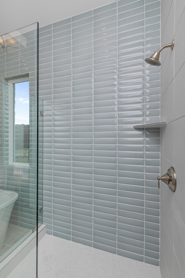 7103A Kyles Creek Dr, Fairview, TN 37062 - full bathroom featuring a tile shower and tile walls