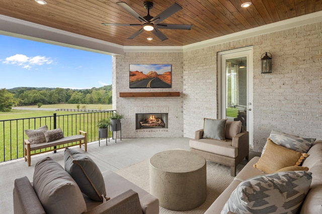 7103A Kyles Creek Dr, Fairview, TN 37062 - view of patio featuring ceiling fan and an outdoor living space with a fireplace