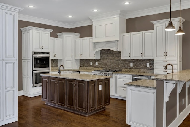 3699 Sweethome Rd, Ashland City, TN 37015 - kitchen with stainless steel appliances, white cabinets, a peninsula, dark wood-style flooring, and ornamental molding