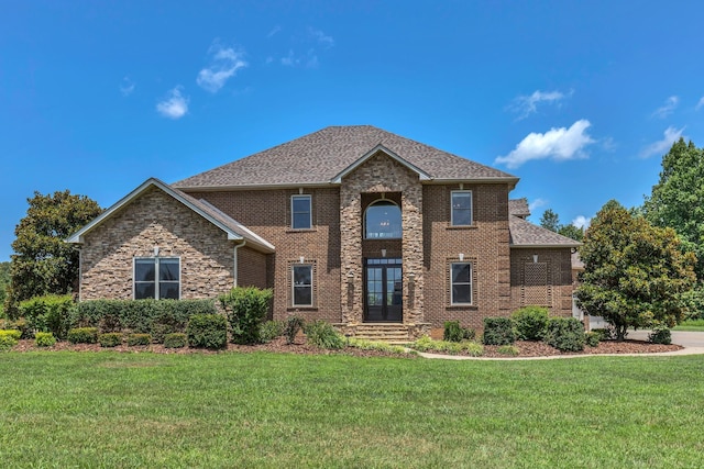 3699 Sweethome Rd, Ashland City, TN 37015 - view of front of home featuring a front lawn, brick siding, and a shingled roof