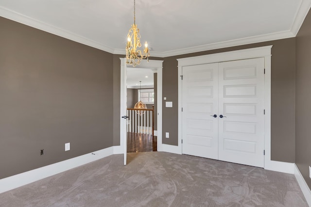 3699 Sweethome Rd, Ashland City, TN 37015 - unfurnished bedroom featuring a chandelier, ornamental molding, carpet floors, and a closet