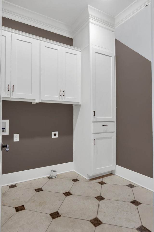 3699 Sweethome Rd, Ashland City, TN 37015 - washroom with hookup for an electric dryer, crown molding, washer hookup, light tile patterned flooring, and cabinet space