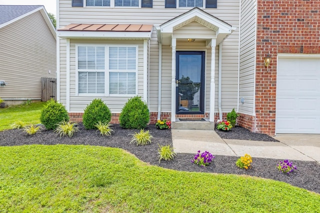1018 Lowrey Pl, Spring Hill, TN 37174 - view of exterior entry featuring a standing seam roof and a metal roof