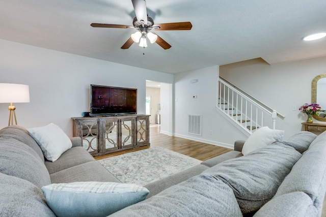 1018 Lowrey Pl, Spring Hill, TN 37174 - living room featuring stairway, wood finished floors, and ceiling fan