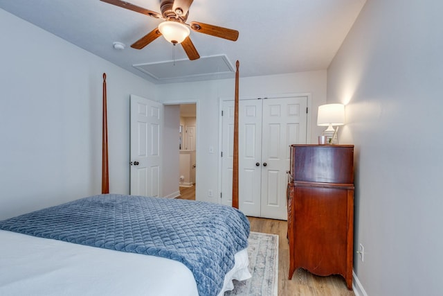 1018 Lowrey Pl, Spring Hill, TN 37174 - bedroom with attic access, light wood-style flooring, a closet, and a ceiling fan