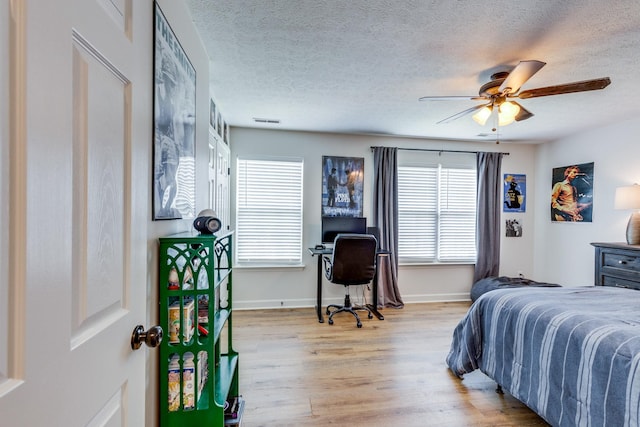 1018 Lowrey Pl, Spring Hill, TN 37174 - bedroom featuring light wood-style floors, a textured ceiling, an office area, and ceiling fan