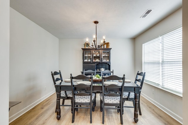 1018 Lowrey Pl, Spring Hill, TN 37174 - dining space featuring a chandelier and light wood-type flooring