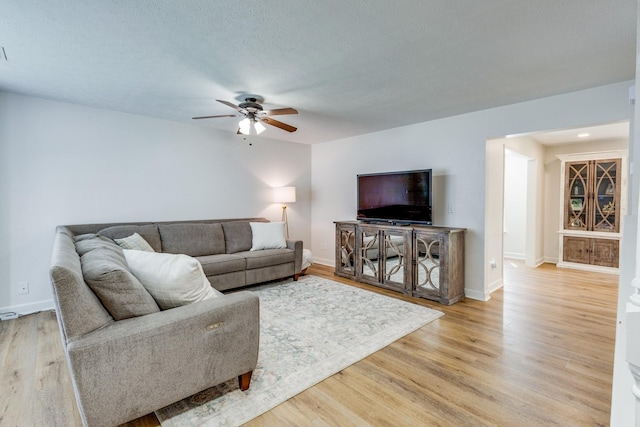 1018 Lowrey Pl, Spring Hill, TN 37174 - living room featuring a ceiling fan and light wood-style flooring