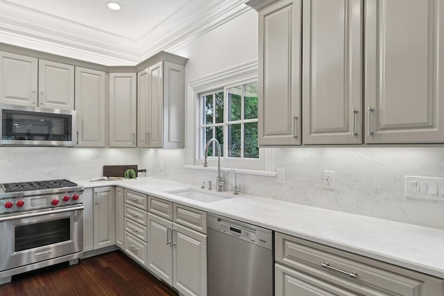 3600 Colewood Dr, Nashville, TN 37215 - kitchen featuring appliances with stainless steel finishes, light countertops, ornamental molding, dark wood-style floors, and gray cabinetry