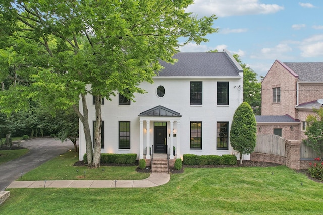 3600 Colewood Dr, Nashville, TN 37215 - colonial inspired home with a front yard and a shingled roof