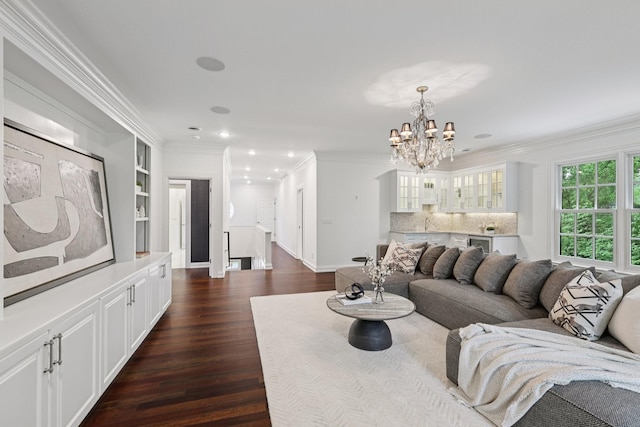 3600 Colewood Dr, Nashville, TN 37215 - living room with crown molding, dark wood-style flooring, a chandelier, recessed lighting, and beverage cooler