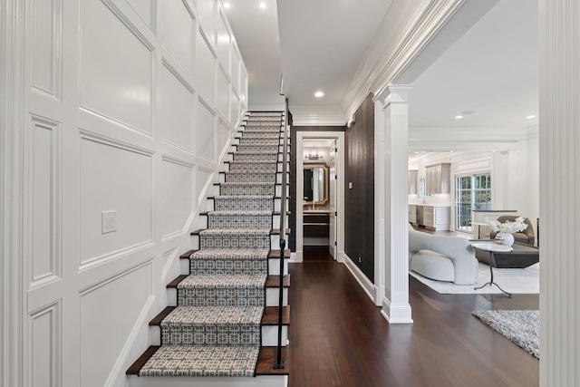 3600 Colewood Dr, Nashville, TN 37215 - stairway featuring a decorative wall, decorative columns, wood finished floors, ornamental molding, and recessed lighting