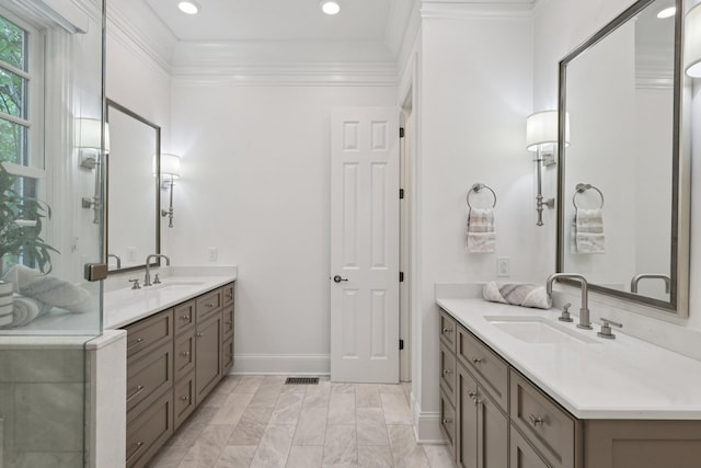 3600 Colewood Dr, Nashville, TN 37215 - bathroom featuring two vanities, crown molding, marble finish flooring, recessed lighting, and an enclosed shower