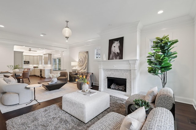 3600 Colewood Dr, Nashville, TN 37215 - living area featuring wood finished floors, recessed lighting, a fireplace, ornamental molding, and a ceiling fan