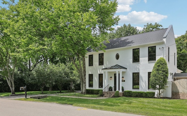 3600 Colewood Dr, Nashville, TN 37215 - view of front facade with a front yard, a shingled roof, and a standing seam roof