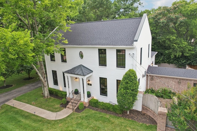 3600 Colewood Dr, Nashville, TN 37215 - view of front of home with a shingled roof, stucco siding, and a front lawn