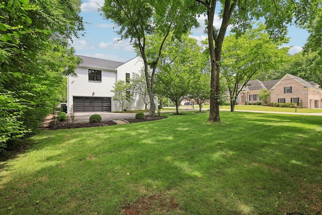 3600 Colewood Dr, Nashville, TN 37215 - view of green lawn with an attached garage and driveway