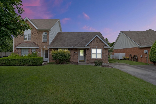 1438 Anita Ct, Murfreesboro, TN 37130 - view of front facade featuring a yard, brick siding, and roof with shingles