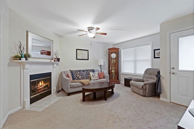 1438 Anita Ct, Murfreesboro, TN 37130 - carpeted living room featuring a fireplace with flush hearth and ceiling fan
