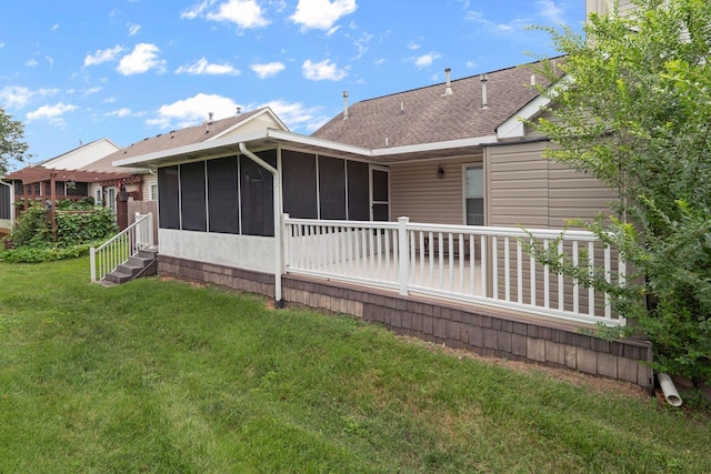 1438 Anita Ct, Murfreesboro, TN 37130 - rear view of property with a sunroom, a lawn, and roof with shingles