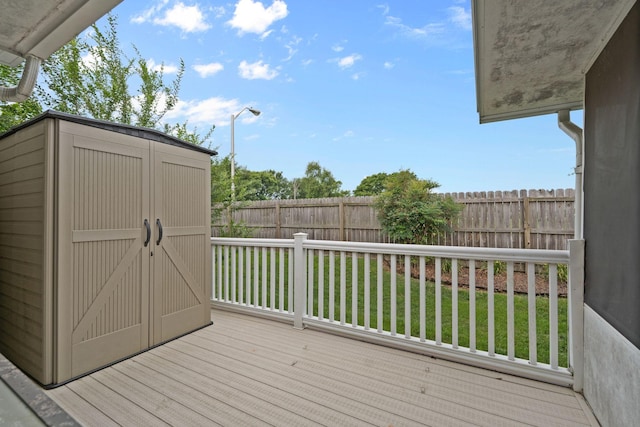 1438 Anita Ct, Murfreesboro, TN 37130 - deck featuring a fenced backyard and a storage shed