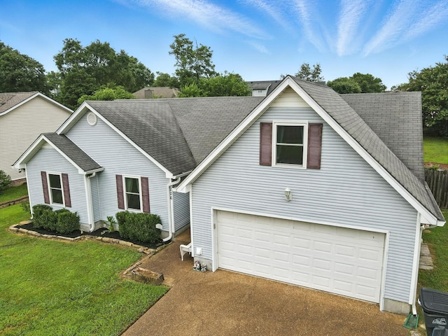 206 Cross Valley Dr, Columbia, TN 38401 - traditional-style house featuring a front yard, driveway, and roof with shingles
