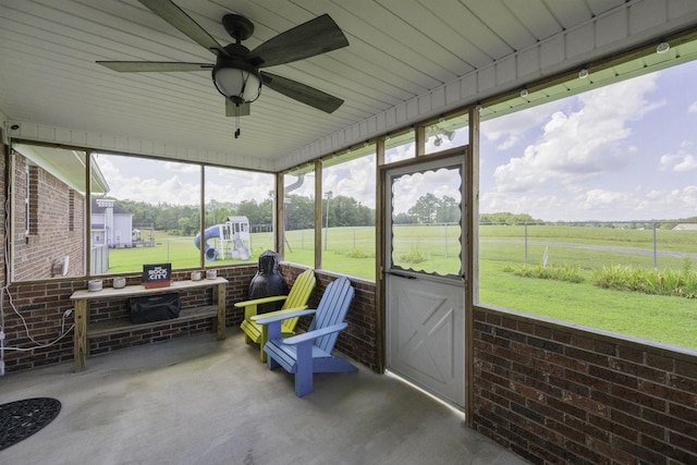 127 Fisherdale Dr, Decaturville, TN 38329 - sunroom with ceiling fan and a view of countryside