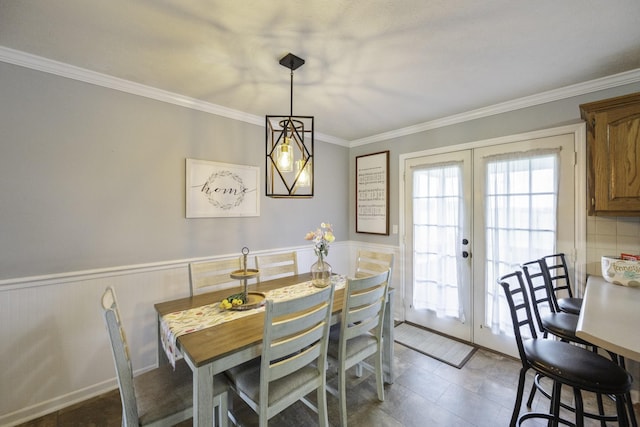 127 Fisherdale Dr, Decaturville, TN 38329 - dining room featuring french doors, crown molding, and wainscoting