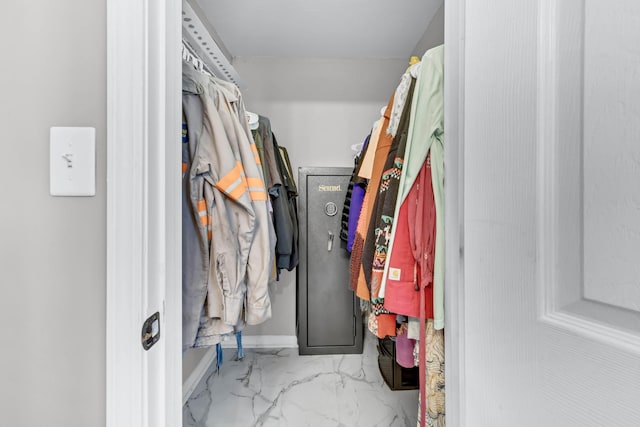 261 Golden Pond Ave, Oak Grove, KY 42262 - walk in closet with marble look tiles