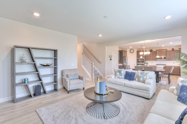 2064 Hedgelawn Dr, Lebanon, TN 37090 - living area featuring stairs, light wood-type flooring, and recessed lighting