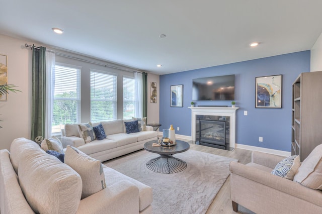 2064 Hedgelawn Dr, Lebanon, TN 37090 - living room featuring wood finished floors, a fireplace, and recessed lighting