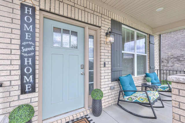 2064 Hedgelawn Dr, Lebanon, TN 37090 - property entrance featuring covered porch and brick siding