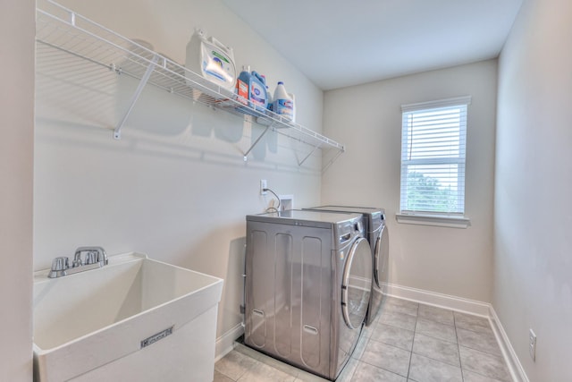2064 Hedgelawn Dr, Lebanon, TN 37090 - laundry room featuring washer and clothes dryer and light tile patterned floors
