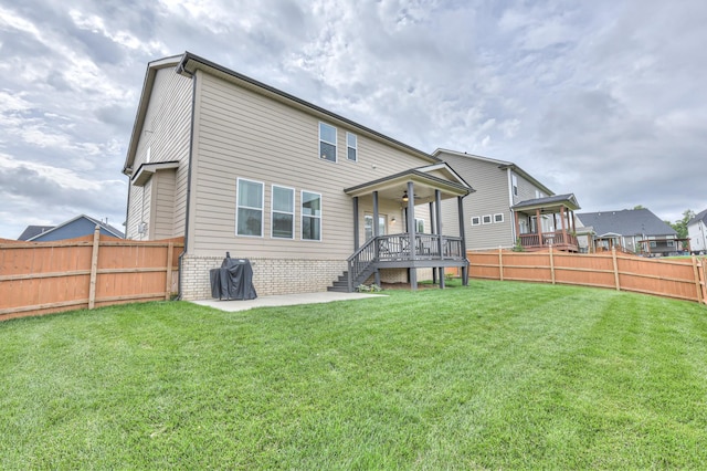 2064 Hedgelawn Dr, Lebanon, TN 37090 - rear view of property featuring a fenced backyard, a patio, a ceiling fan, and a deck