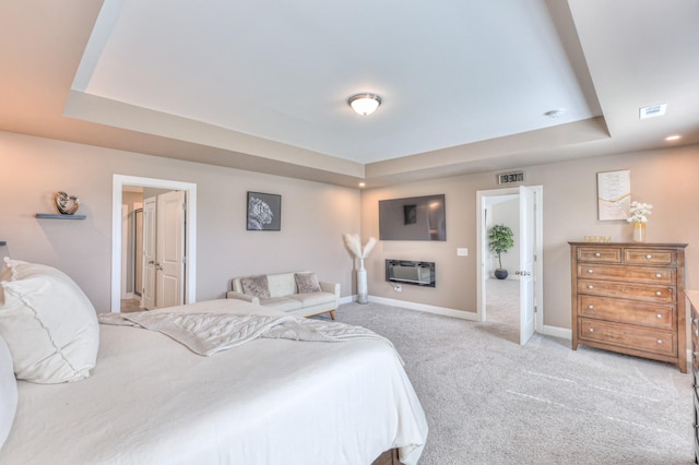 2064 Hedgelawn Dr, Lebanon, TN 37090 - bedroom with a tray ceiling and light carpet
